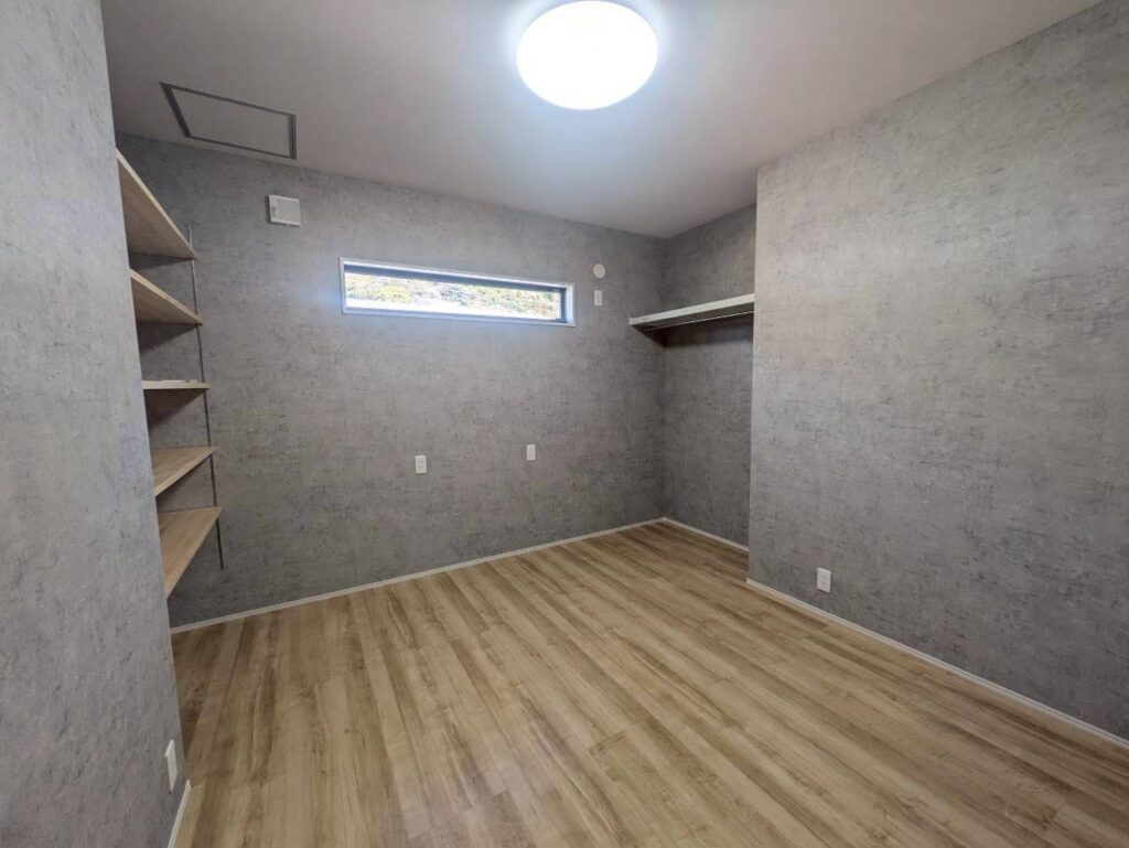 インナーガレージのある開放的な住まい